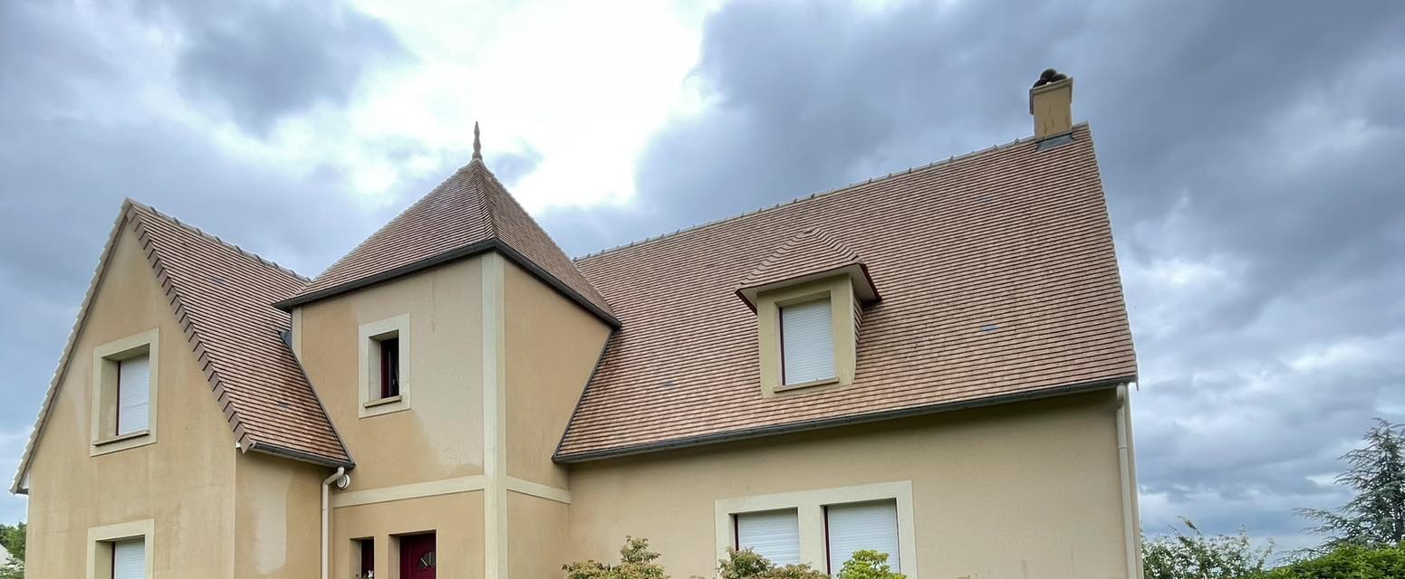 Démoussage de toiture après